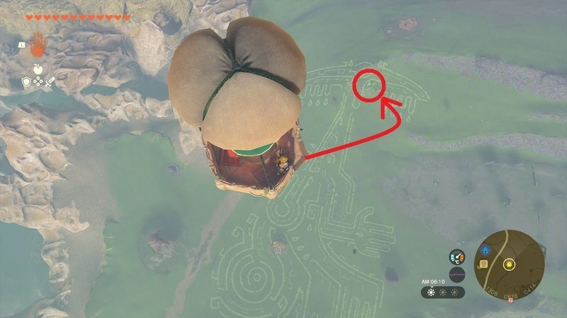 地上絵の目の部分にパラセールで降下する