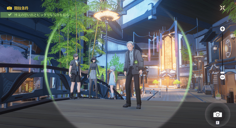 背後の親子が映るように