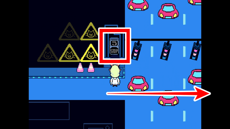 信号のボタンを押して車を止める3