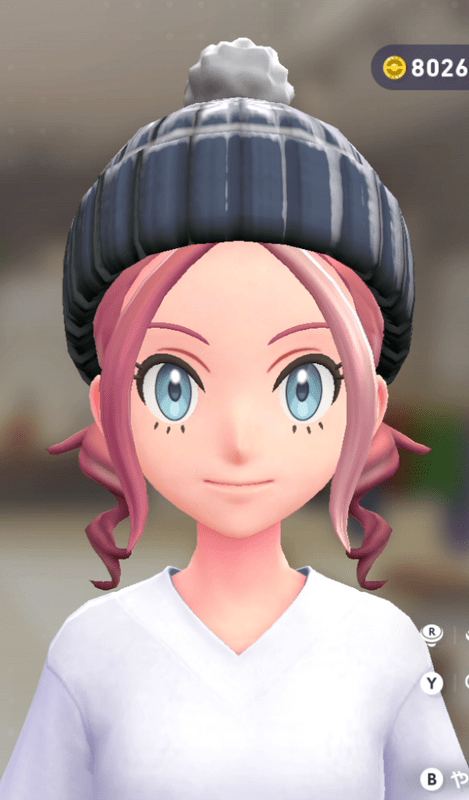 ポンポンつきニットキャップ