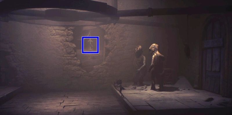 壁の穴のロープを弓で狙撃する