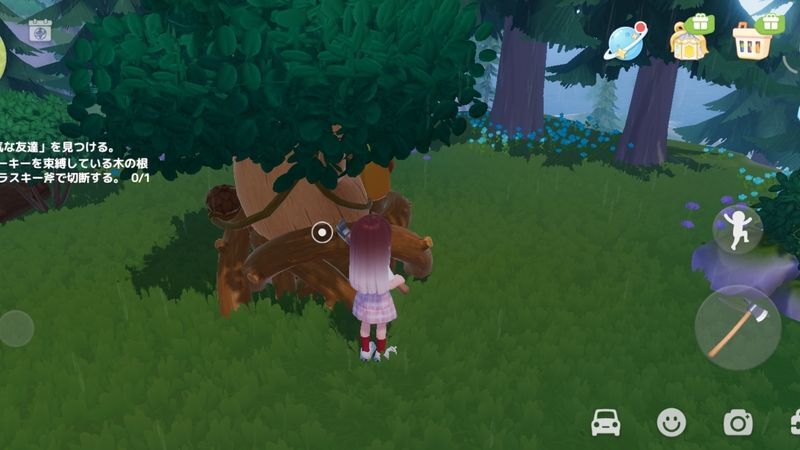 斧で木の根を切断する