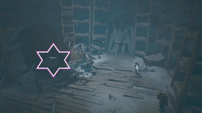 画面手前の人形に刺さっている槍を拾う