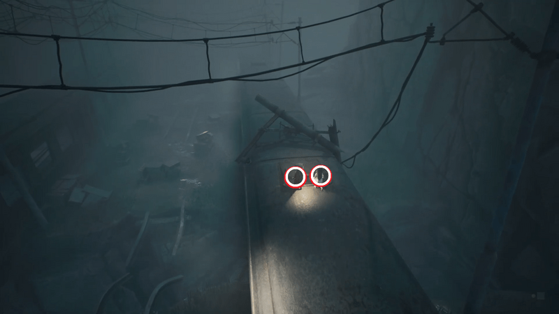 奥の車両のハシゴを登る