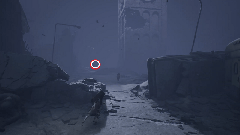 目の前の壁の裂け目を通って奥へ