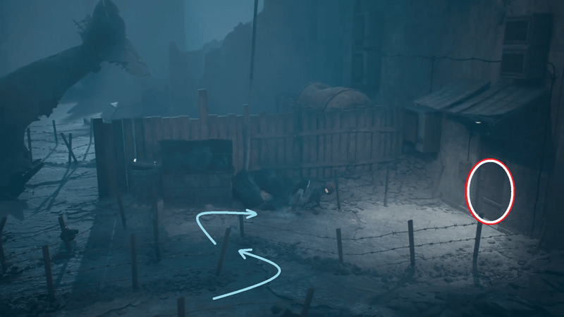 右側建物のドアに入る