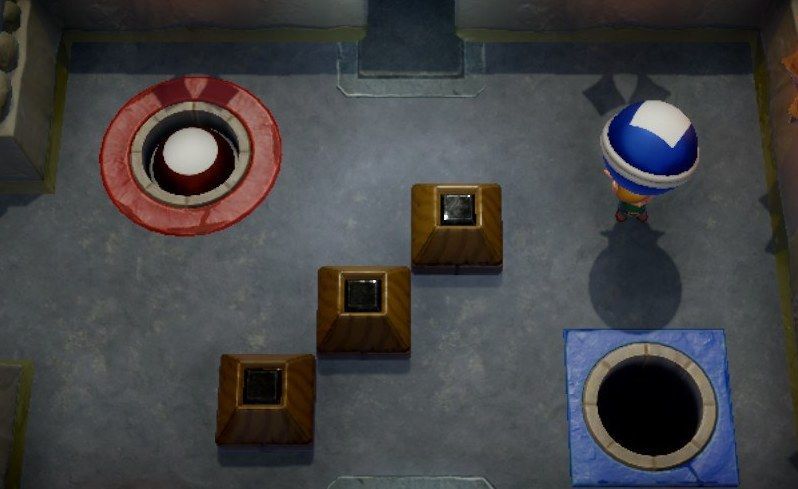 穴に投げ入れる